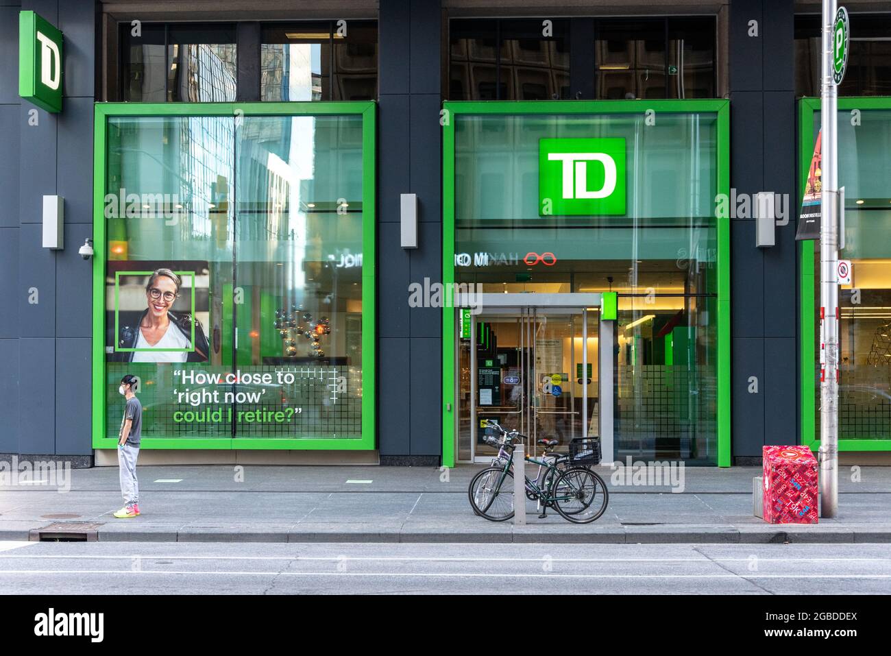 Entrance doors in the facade of a TD or Toronto Dominion Bank in Bloor Street West in Toronto city, Canada Stock Photo
