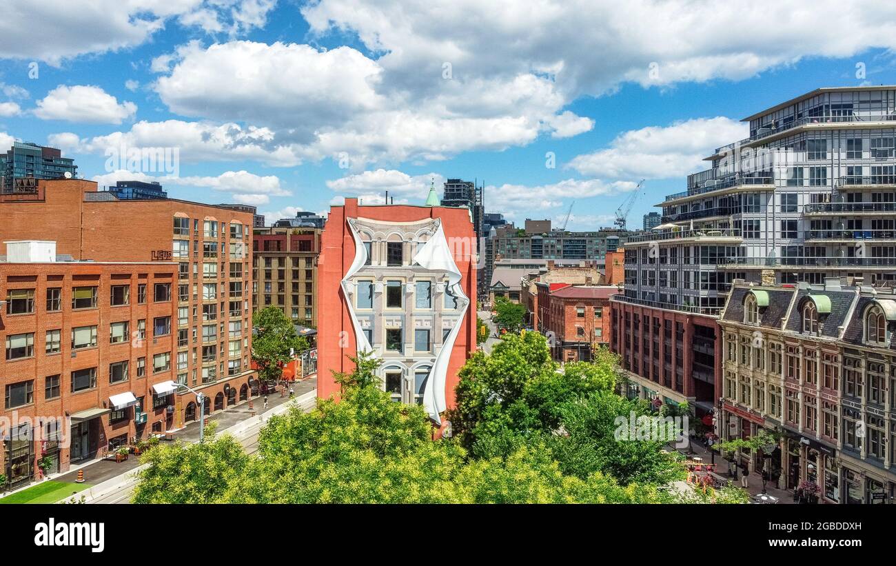 Old town and the mural in the Flatiron or Gooderham building. Drone point of view famous place in Toronto, Canada Stock Photo