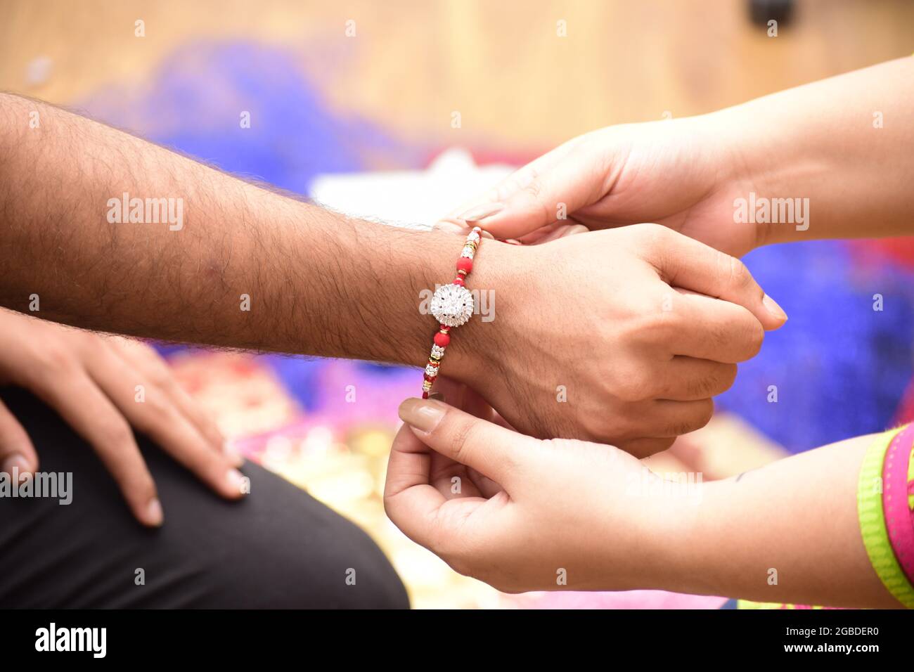 Indian young sister tying rakhi hi-res stock photography and images - Alamy