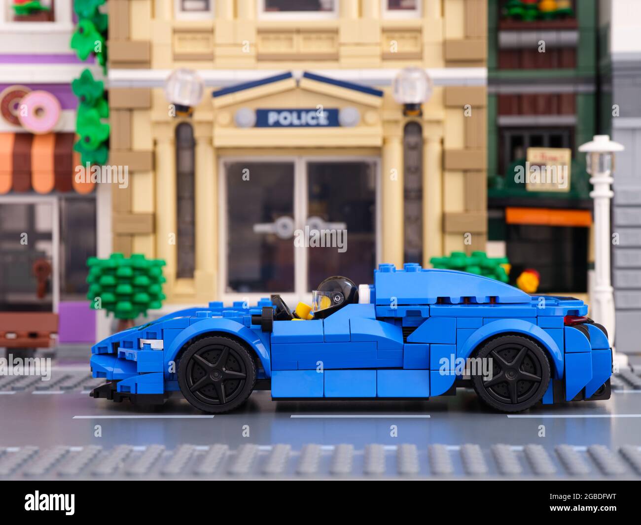 Tambov, Russian Federation - July 02, 2021 Lego McLaren Elva car by LEGO Speed Champions with driver inside on city street. Stock Photo