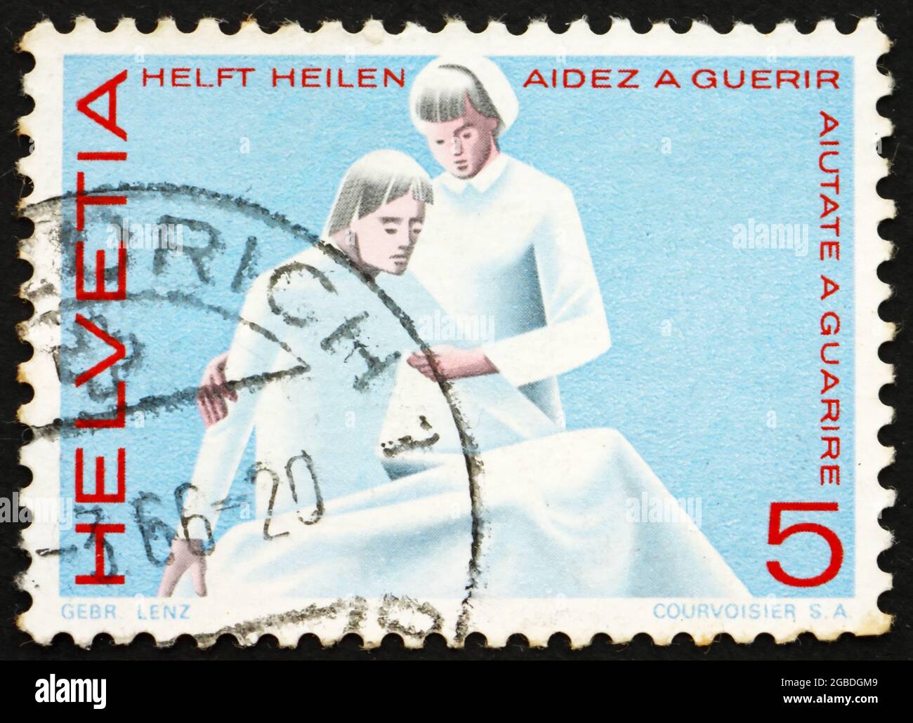 SWITZERLAND - CIRCA 1965: a stamp printed in the Switzerland shows Nurse and Patient, Medical Profession, circa 1965 Stock Photo