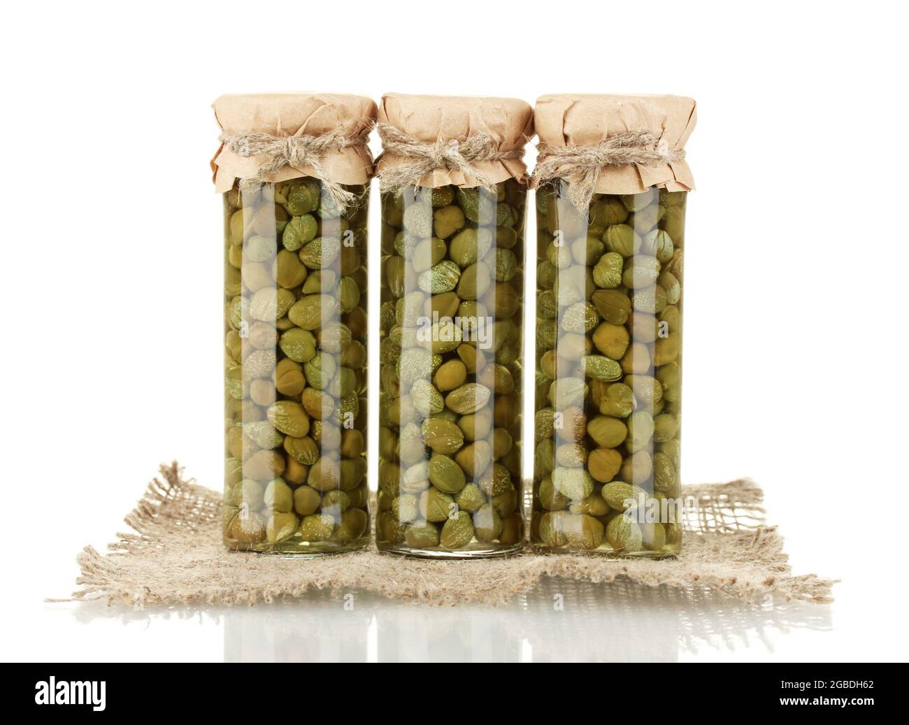 Glass jar with tinned capers isolated on white Stock Photo Alamy