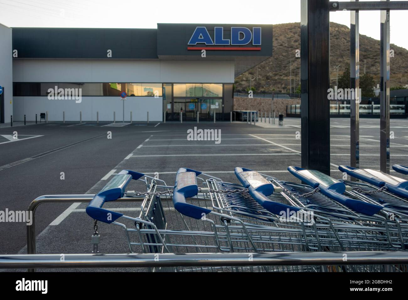 MADRID, SPAIN - JULY 16, 2021: Shopping carts in a shopping park, close to Aldi supermarket Stock Photo
