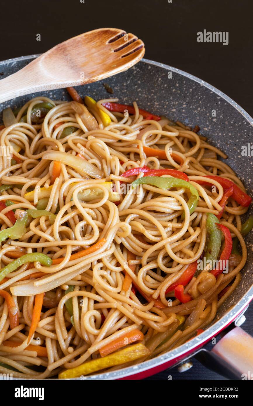 Spaghetti and vegetables wok with soy sauce Stock Photo - Alamy