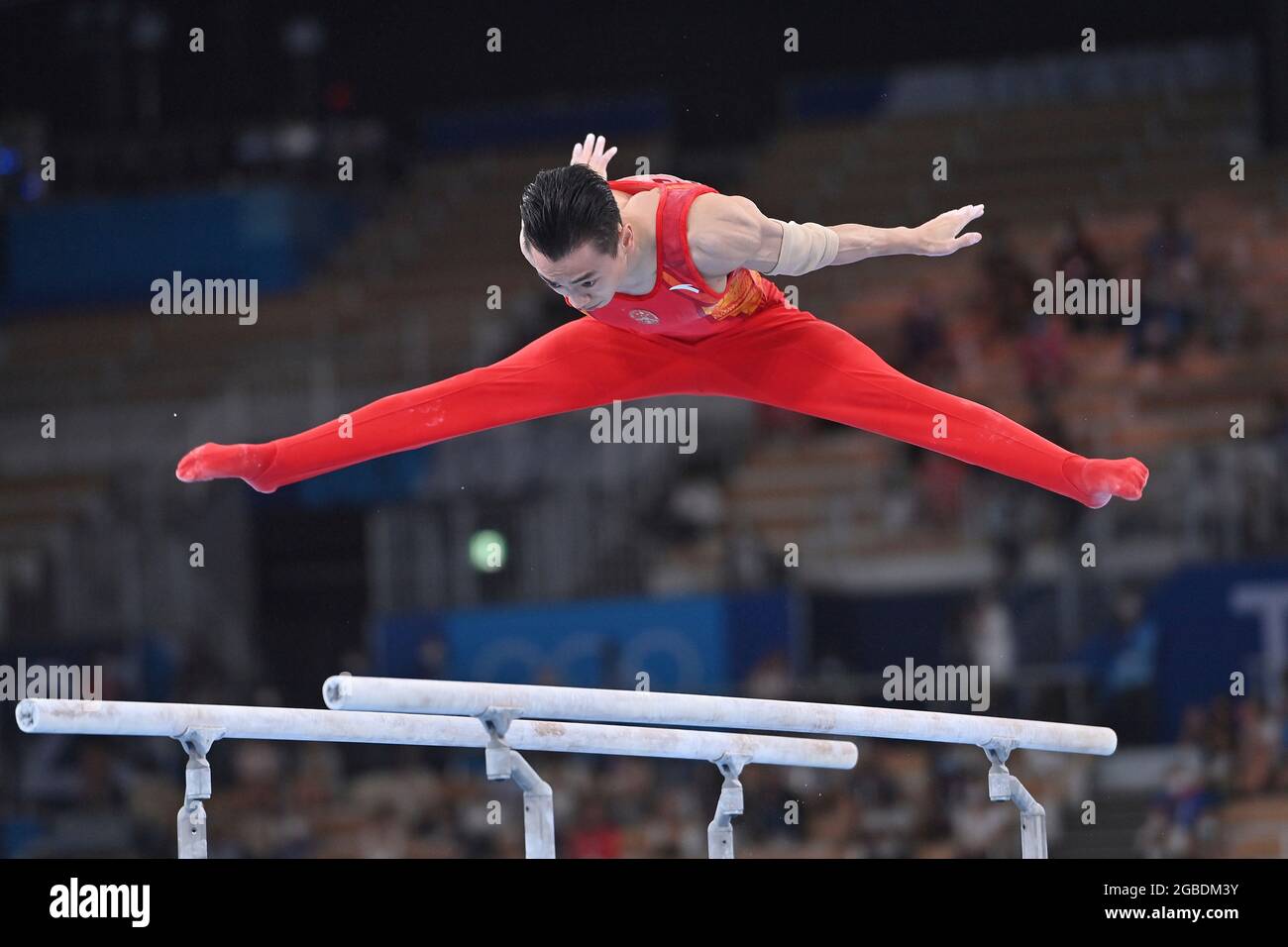 Tokyo, Japan. 03rd Aug, 2021. Jingyuan ZOU (CHN), action, winner, winner, Olympic champion, 1st place, gold medal, gold medalist, Olympic champion, gold medalist Artistic Gymnastics, gymnastics, apparatus final of men, apparatus final, parallel bars menÕs parallel bars, on 03.08.2021 Ariake Gymnastics Center. Olympic Summer Games 2020, from 23.07. - 08.08.2021 in Tokyo/Japan. Credit: dpa/Alamy Live News Stock Photo