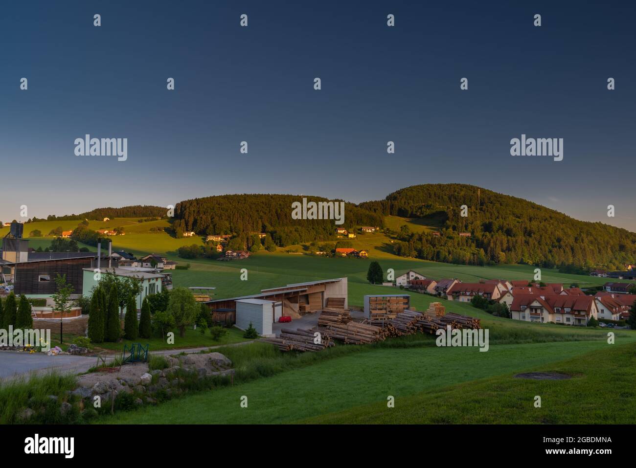 Semriach color village with Schockl hill over in sunset sunny morning Stock Photo