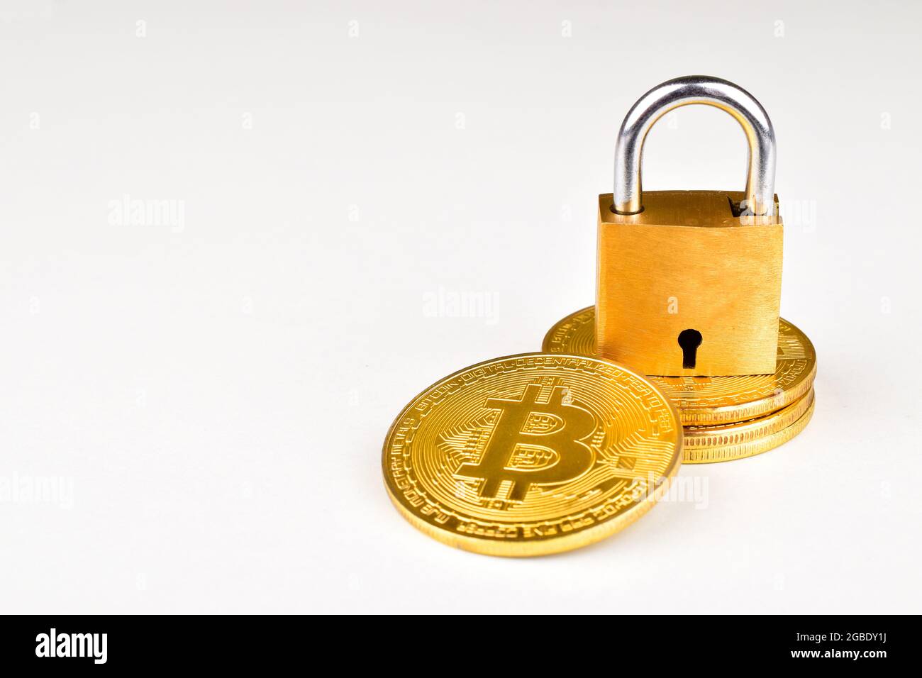bitcoin lock concept, cryptocurrency bitcoin with padlock isolted on white background, Stock Photo