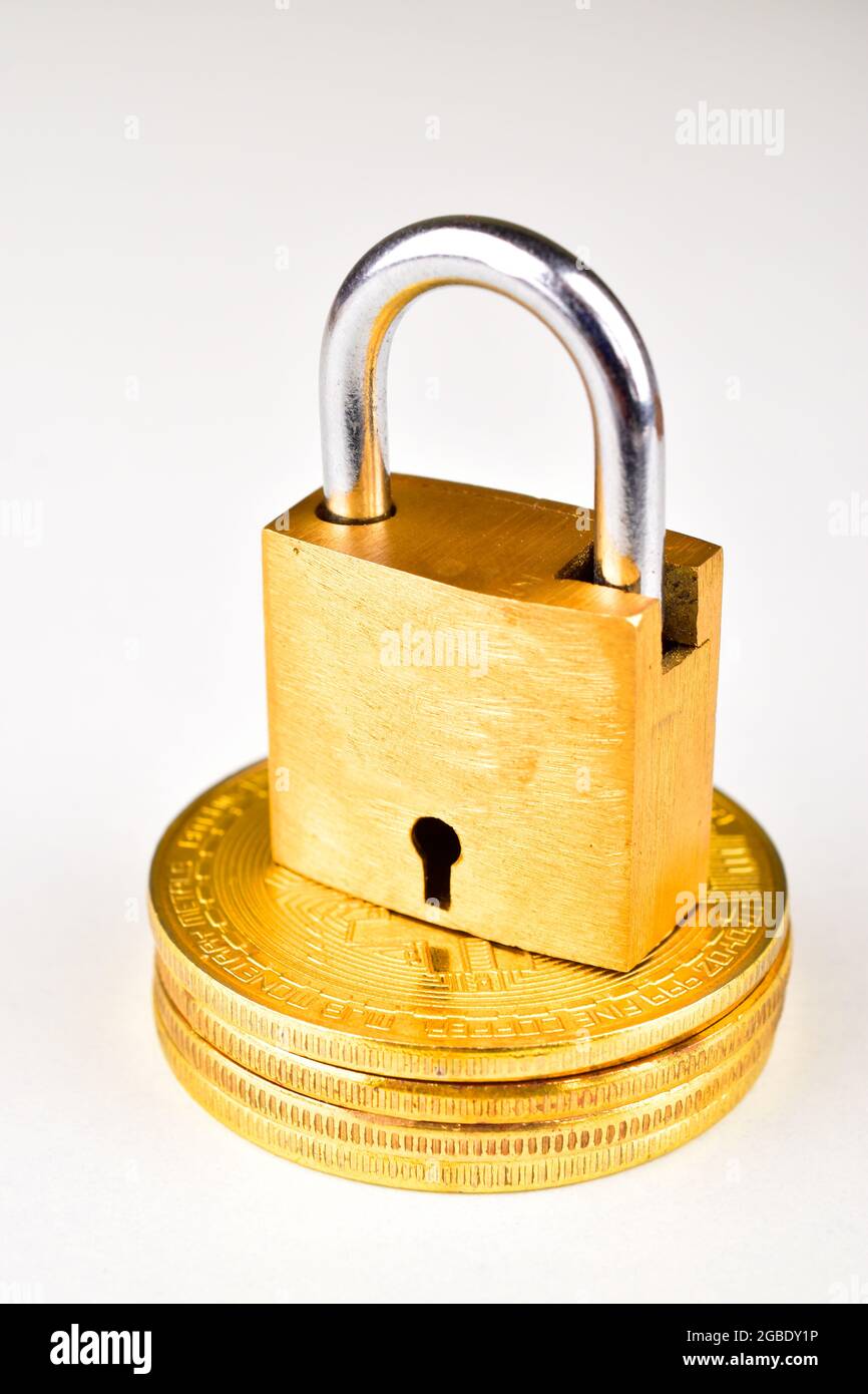 Lock With Bitcoin Isolated On White Background Stock Photo