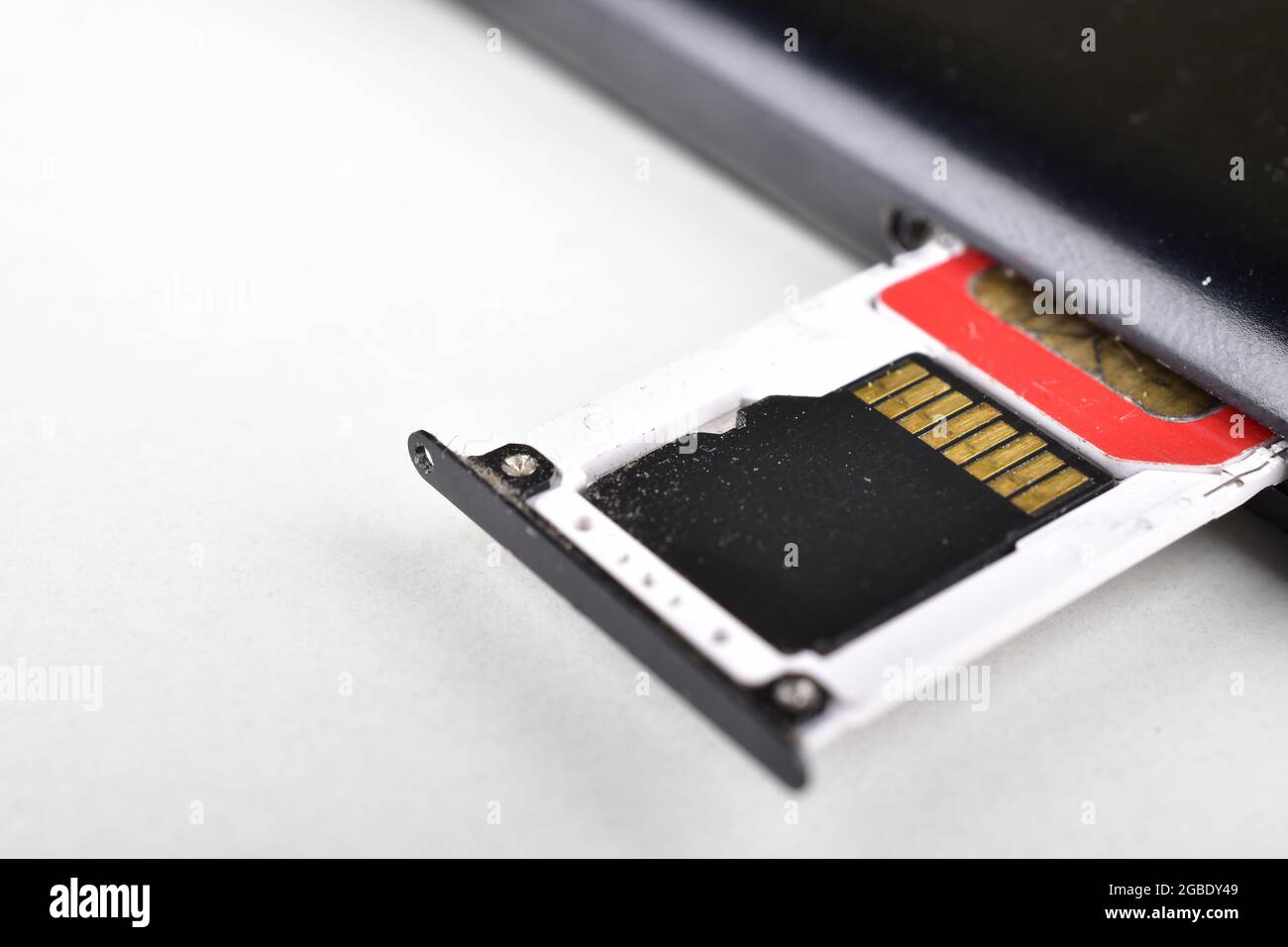 Removing Corrupt Memory Card and Sim From Smartphone Stock Photo