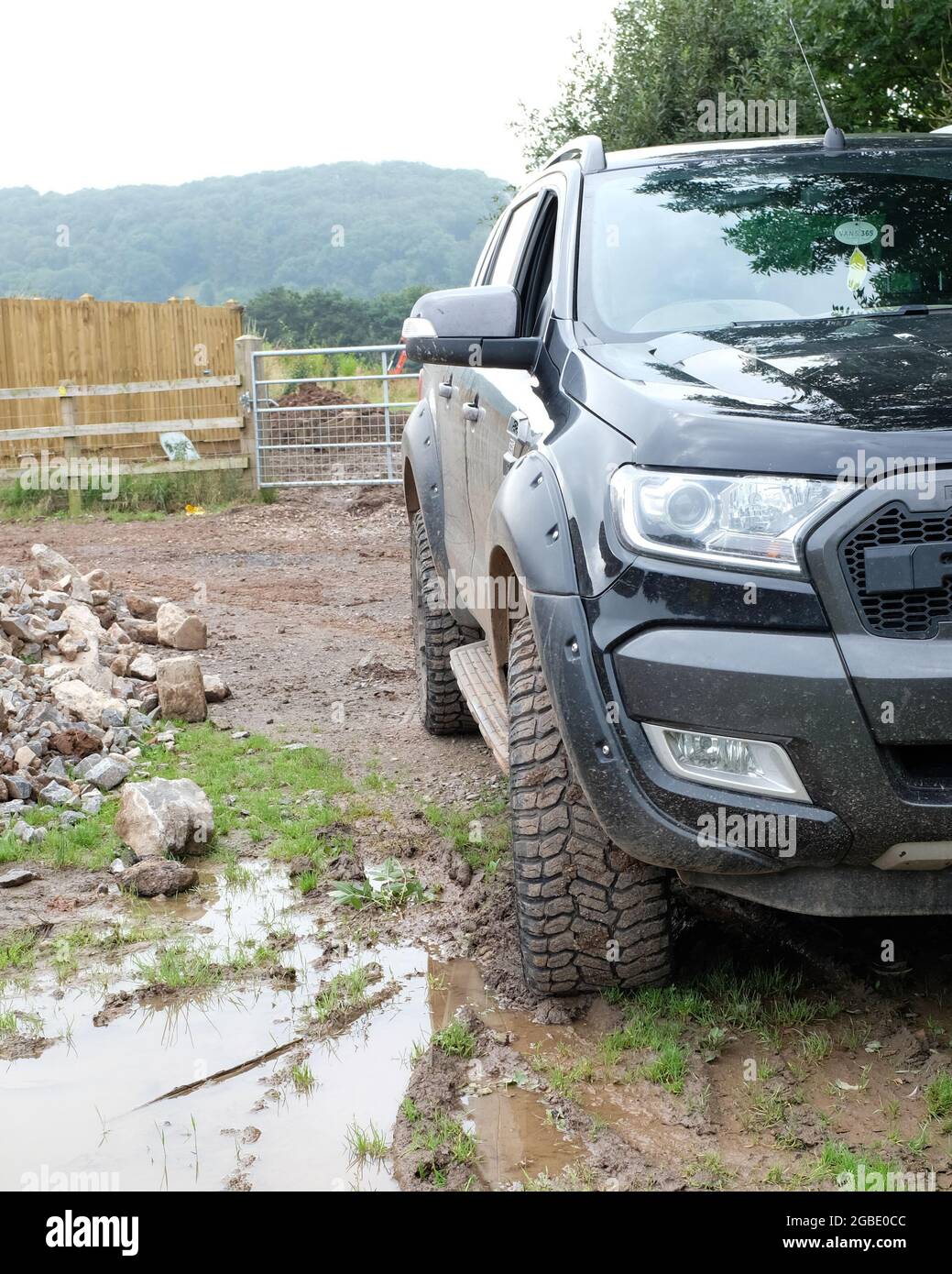 August 2018 - Ford truck beside a mud puddle on a construction site in rural Somerset, UK. Stock Photo