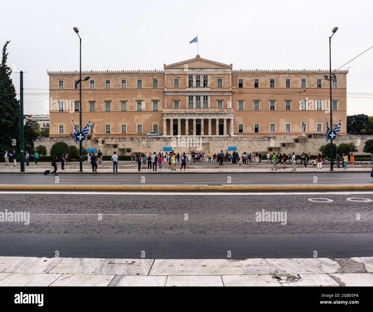Athens, Greece - September 24, 2019: Hellenic Parliament. Palace for Greek parliament, with ceremonial guards and memorial for unidentified soldiers Stock Photo
