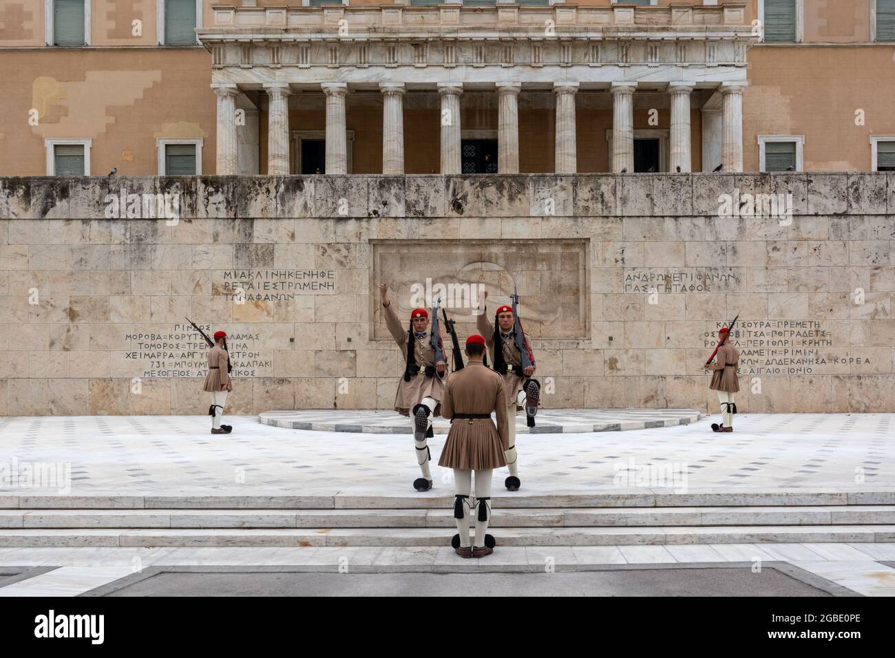 Athens, Greece - September 24, 2019: Hellenic Parliament. Presidential guards changing ceremony in front of the Tomb of the unknown soldier. Palace fo Stock Photo