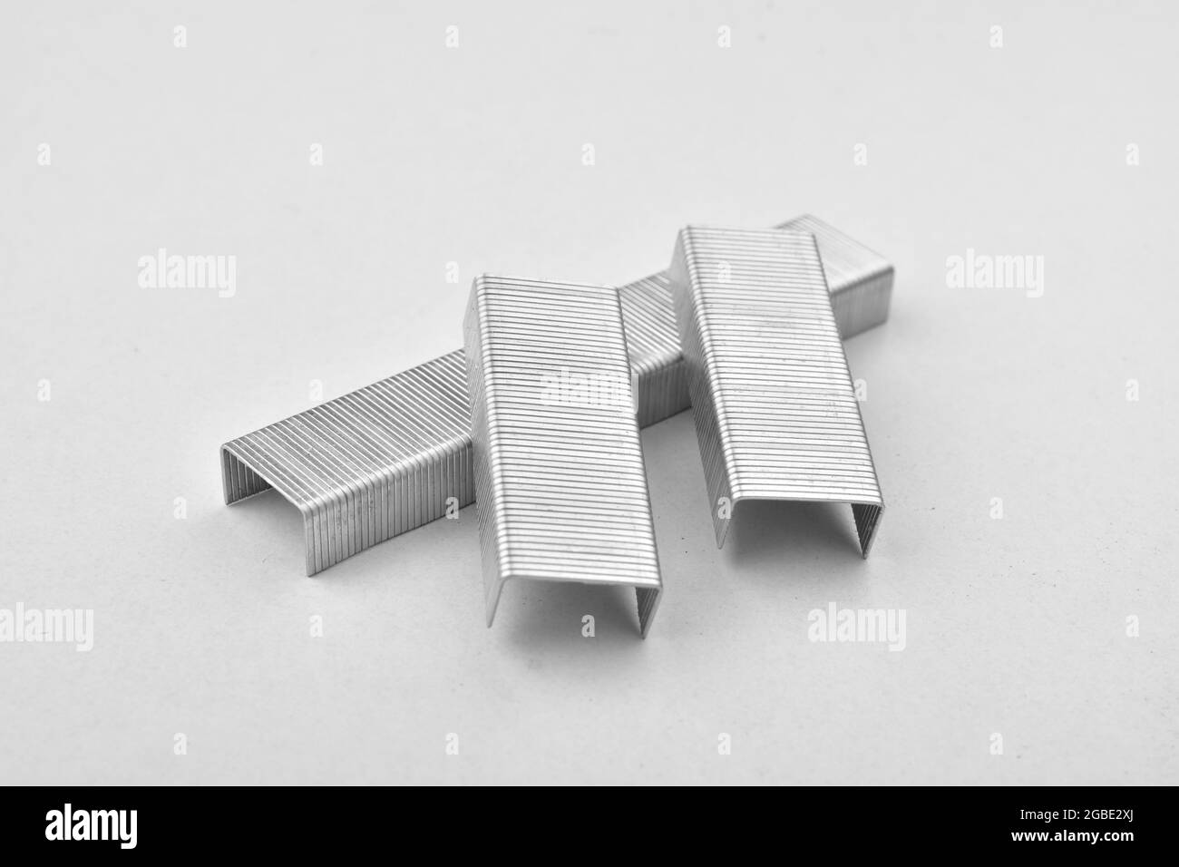 Stack Of Stapler Pin Isolated On White Background Stock Photo - Alamy