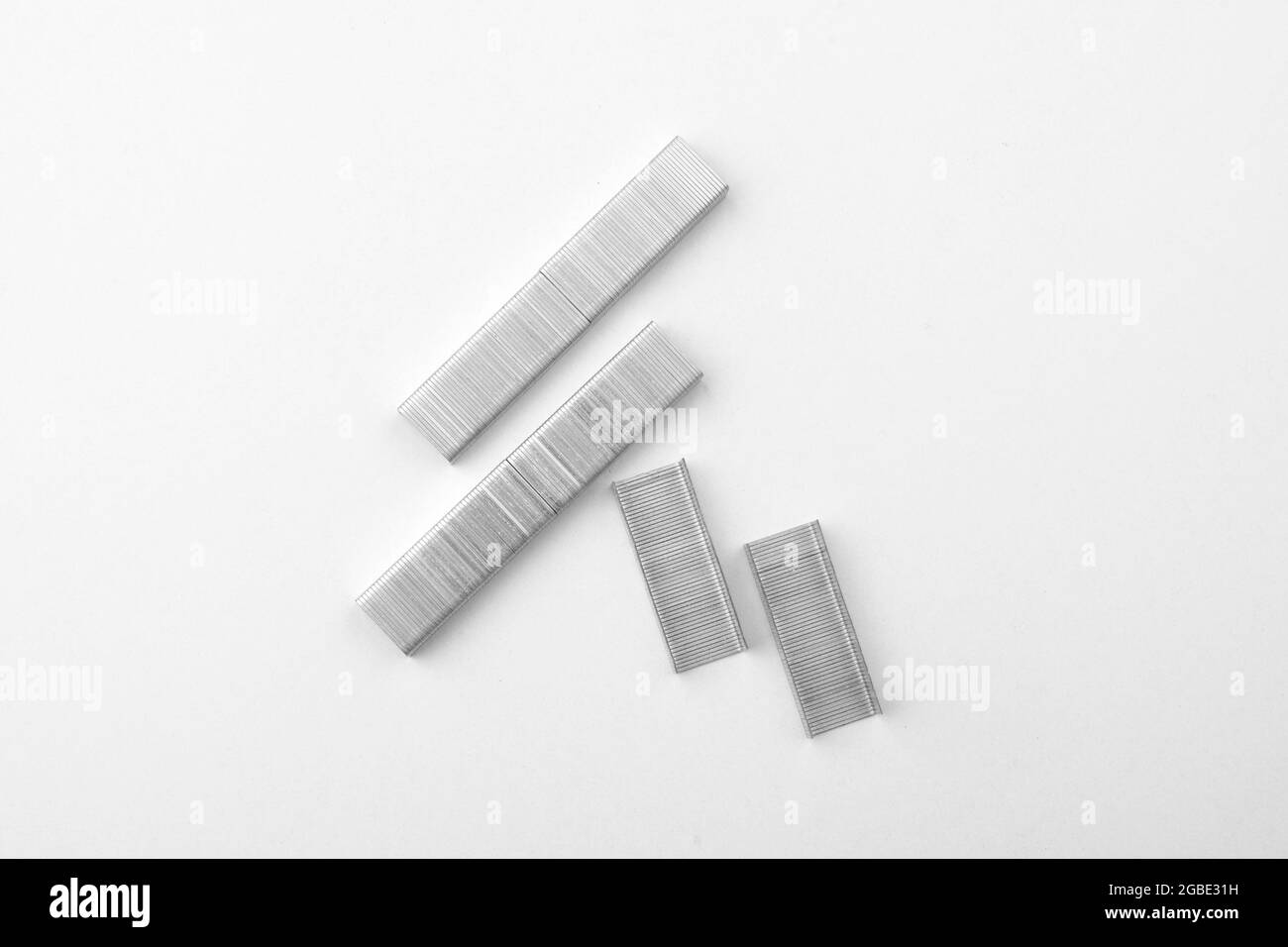 Top View Of Stapler Pins On White Background Stock Photo - Alamy