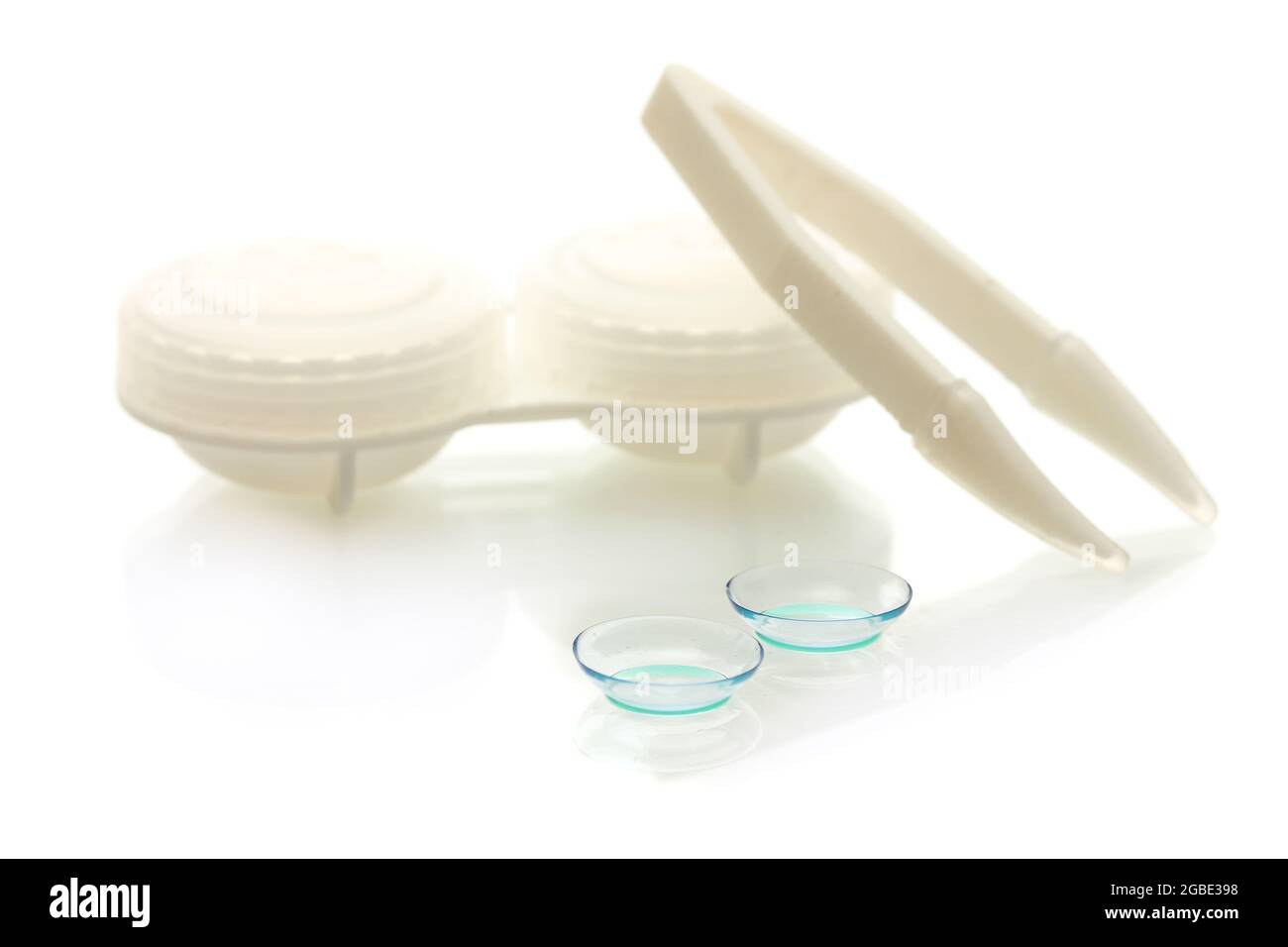 contact lenses, containers and tweezers isolated on white Stock Photo