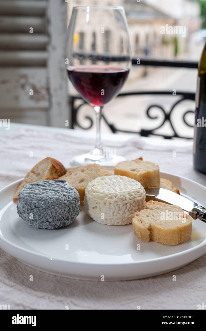 Tasting Of Burgundy Red Wine From Grand Cru Pinot Noir Vineyards With French Goat Cheeses And View On Old Town Street In Burgundy Cote De Nuit Wine R Stock Photo Alamy