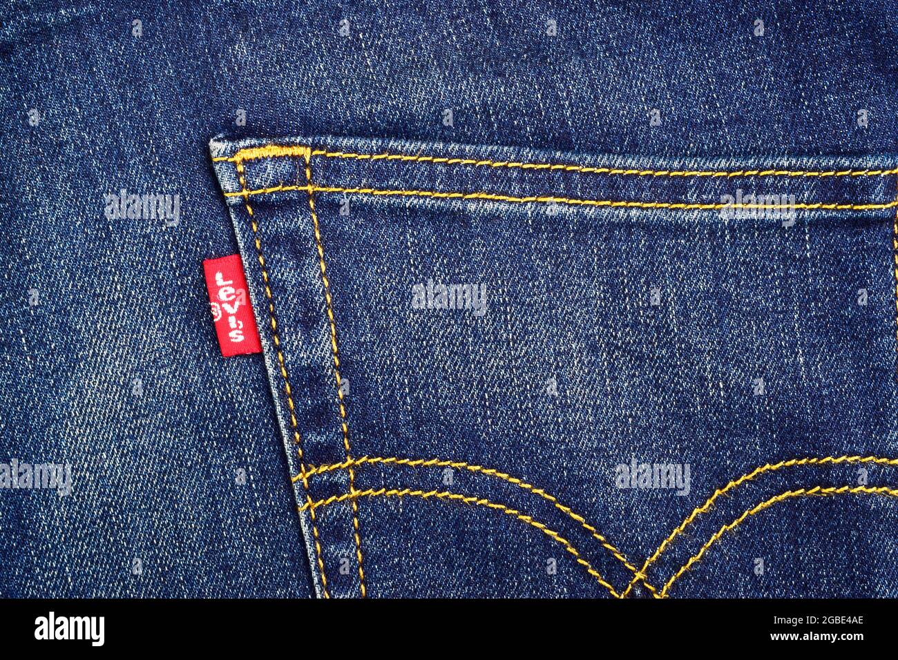 India, New Delhi - October 15, 2018: Close up of the LEVI'S red label on the back pocket of denim jeans. Stock Photo
