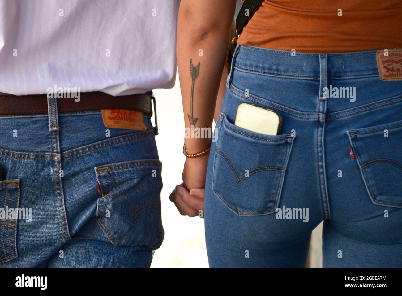 30 year old asian girls posing in tight levi's