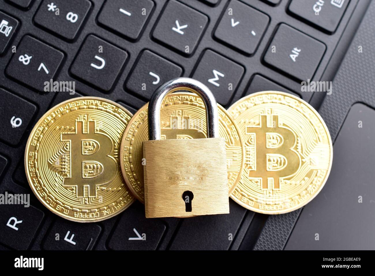 bitcoin security , bitcoin with padlock on laptop keyboard Stock Photo ...