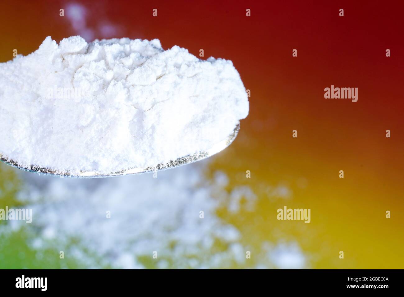 Closeup shot of the flour in the spoon Stock Photo - Alamy