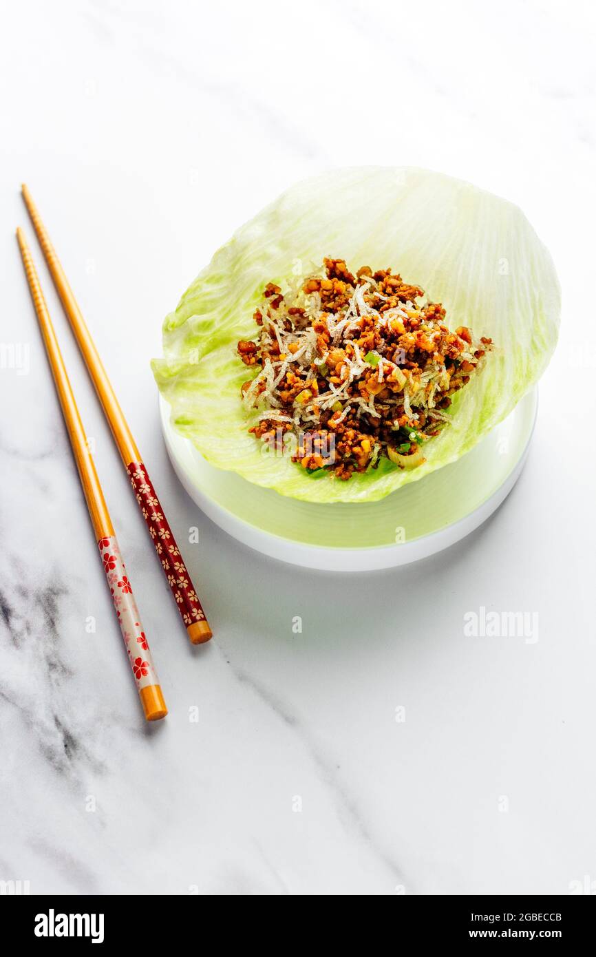 Pork Yuk Sung, Chinese Lettuce Wraps, Traditional Meal in China - FOODPIX WHITE Stock Photo