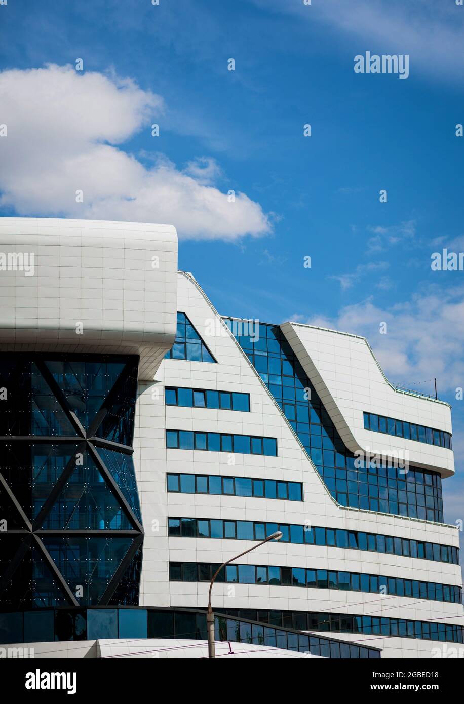 Modern office building, luxury hotel over blue sky Stock Photo - Alamy