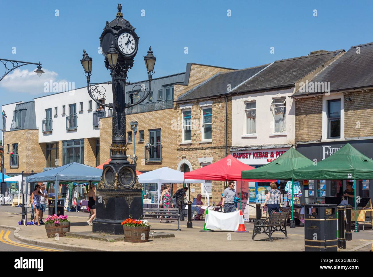 19th century Clock Tower and market stalls, Great Whyte, Ramsey, Cambridgeshire, England, United Kingdom Stock Photo