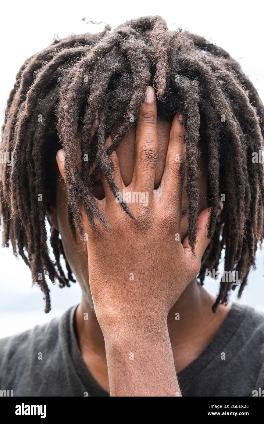 Dreadlocks covering face hi-res stock photography and images - Alamy