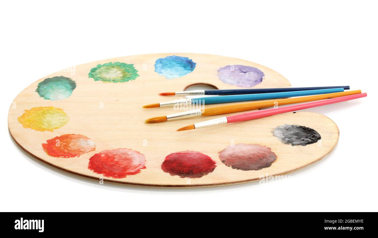 wooden art palette with paint and brushes isolated on white Stock Photo ...