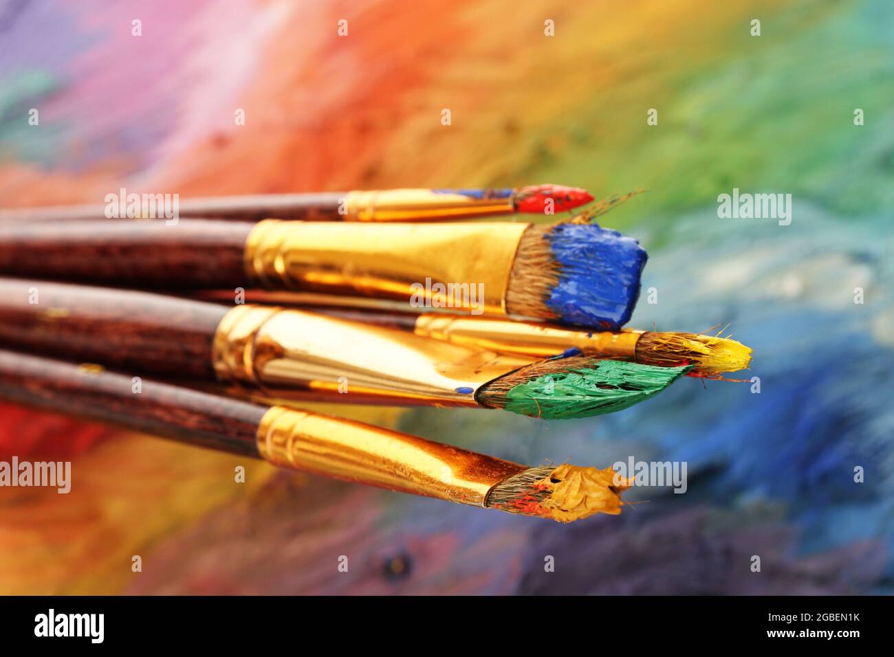 acrylic paint and brushes on wooden palette Stock Photo Alamy