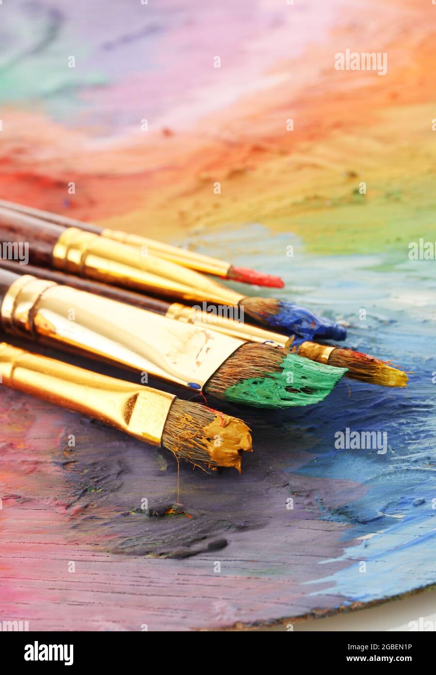 acrylic paint and brushes on wooden palette Stock Photo Alamy
