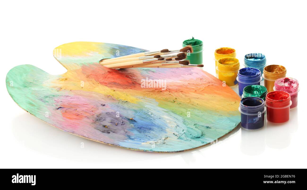 wooden art palette with paint and brushes isolated on white Stock Photo ...
