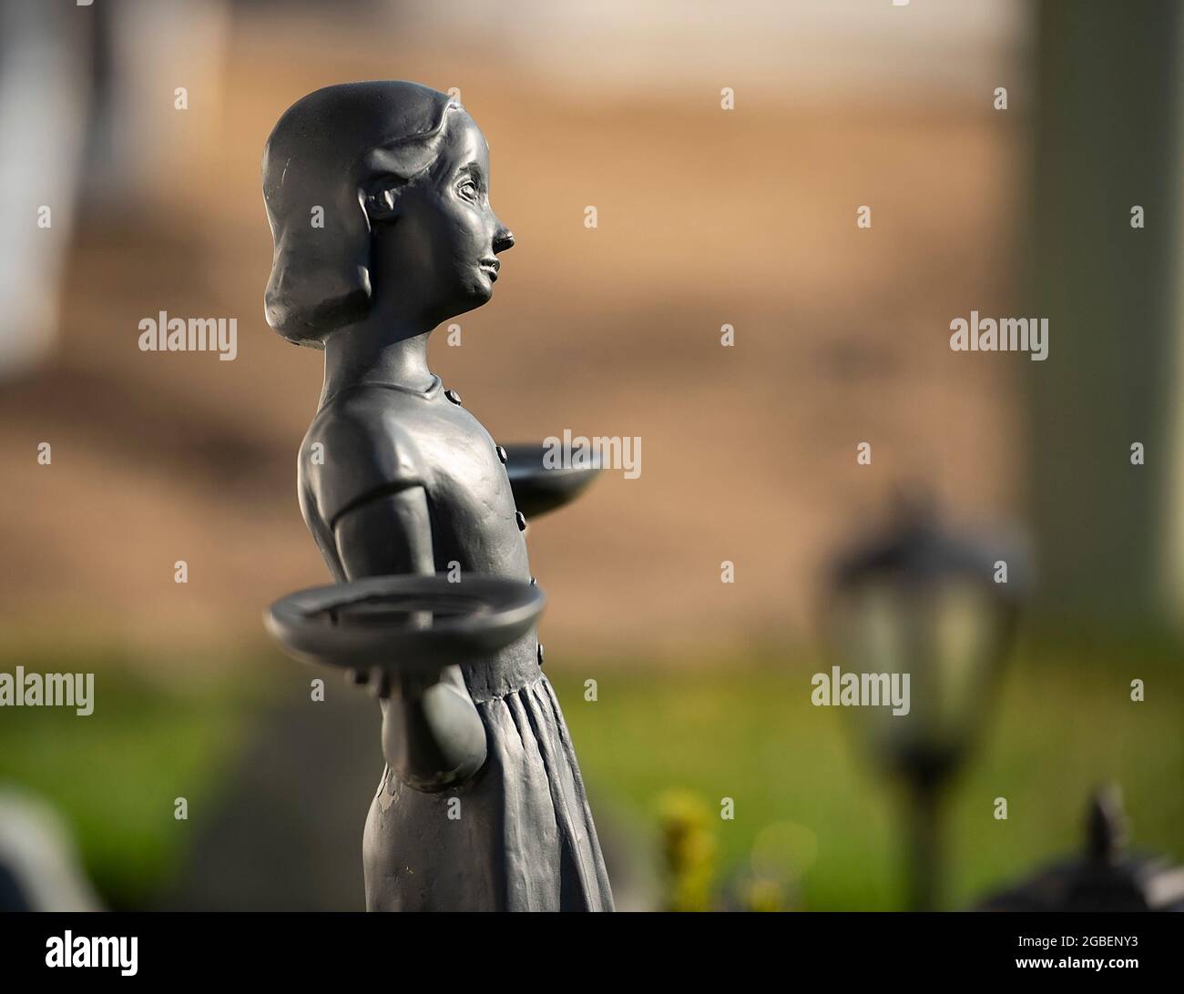 Pinckney, Michigan, USA. 3rd Aug, 2021. The Bird Girl' sits in a homeowners garden in August of the year 2021. The statue was made famous in a book called 'Midnight in the Garden of Good and Evil. (Credit Image: © Mark Bialek/ZUMA Press Wire) Stock Photo