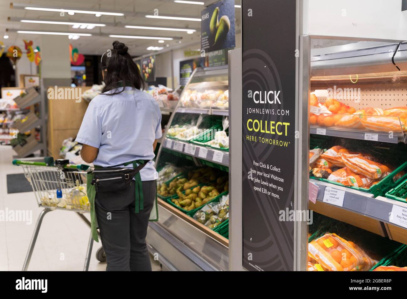 staff member collecting products for Click and collect at John Lewis