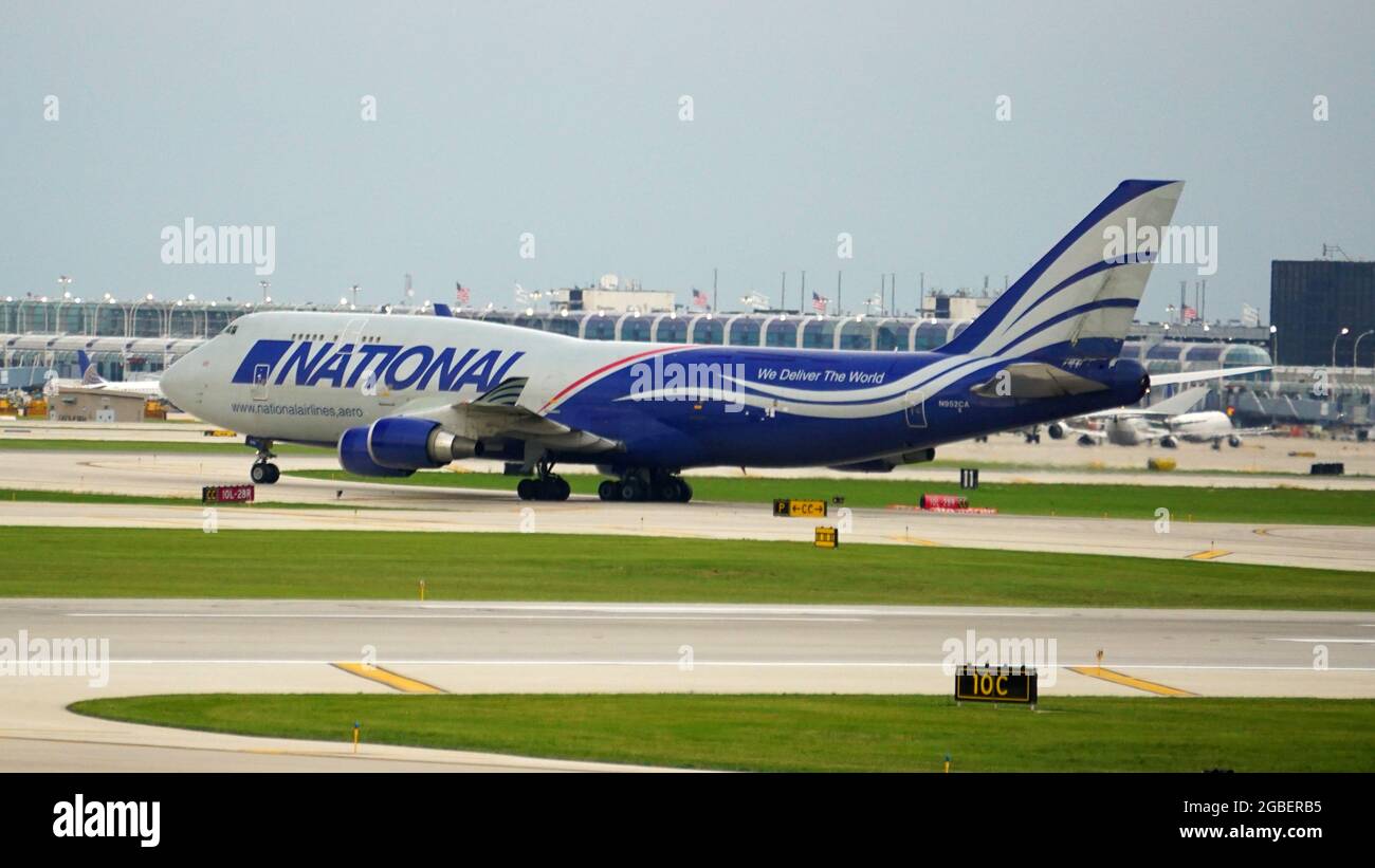 CHICAGO, UNITED STATES - Jul 16, 2021: A National Airlines Boeing 747 cargo plane taxiing on the runway at Chicago O'Hare Airport Stock Photo