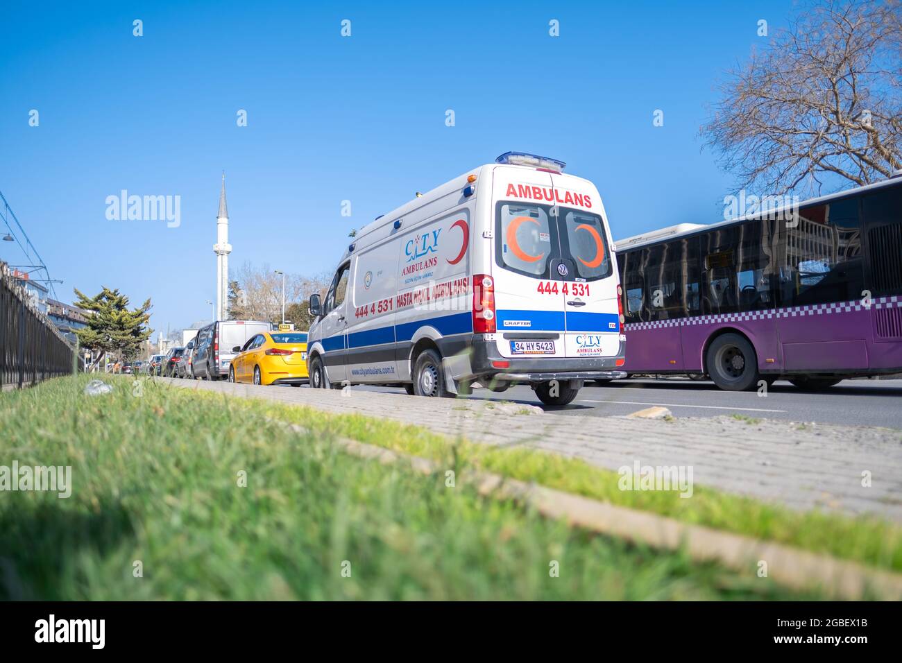 Findikli, Istanbul, Turkey - 02.26.2021: ambulance is on way in a traffic jam in Istanbul road near sea with copy space Stock Photo