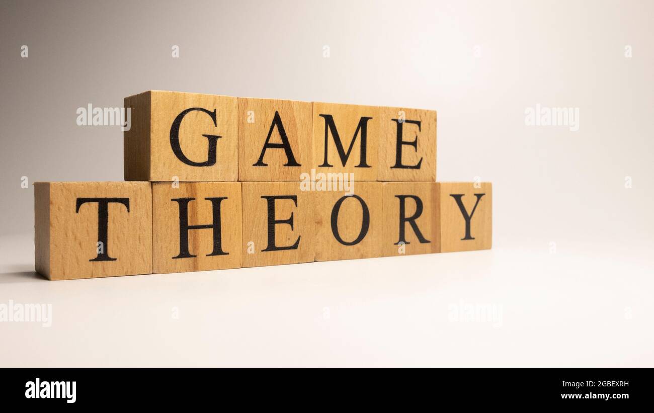 The Name Game Theory Was Created From Wooden Letter Cubes Economics And Finance Close Up Stock Photo Alamy