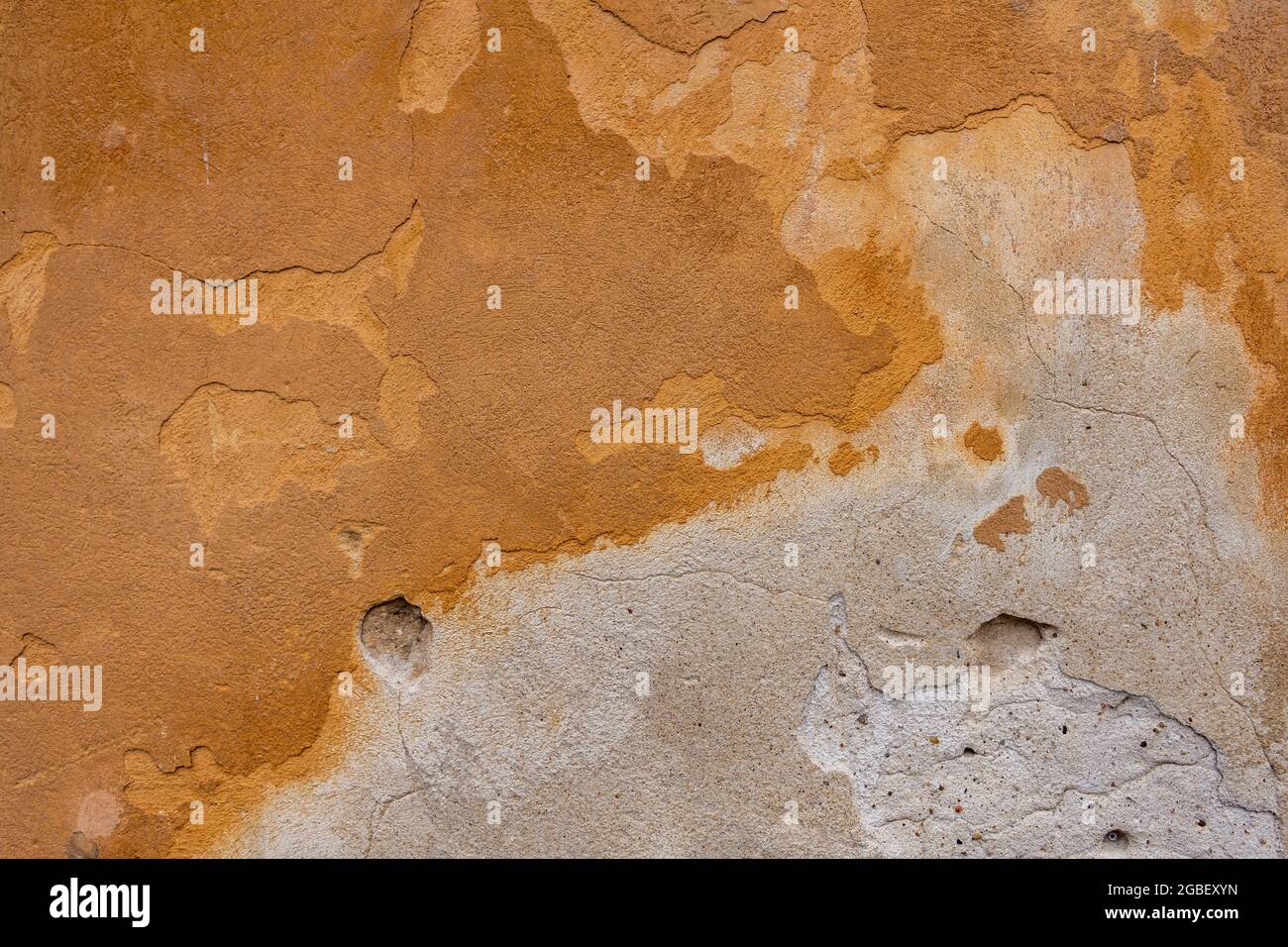 Yellow grunge wall texture background Stock Photo