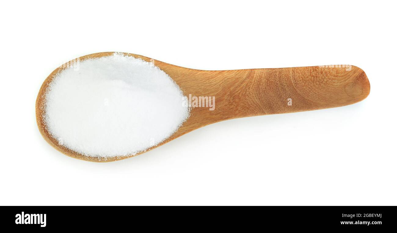 Top view of Sodium Bicarbonate in wooden spoon isolated on white ...