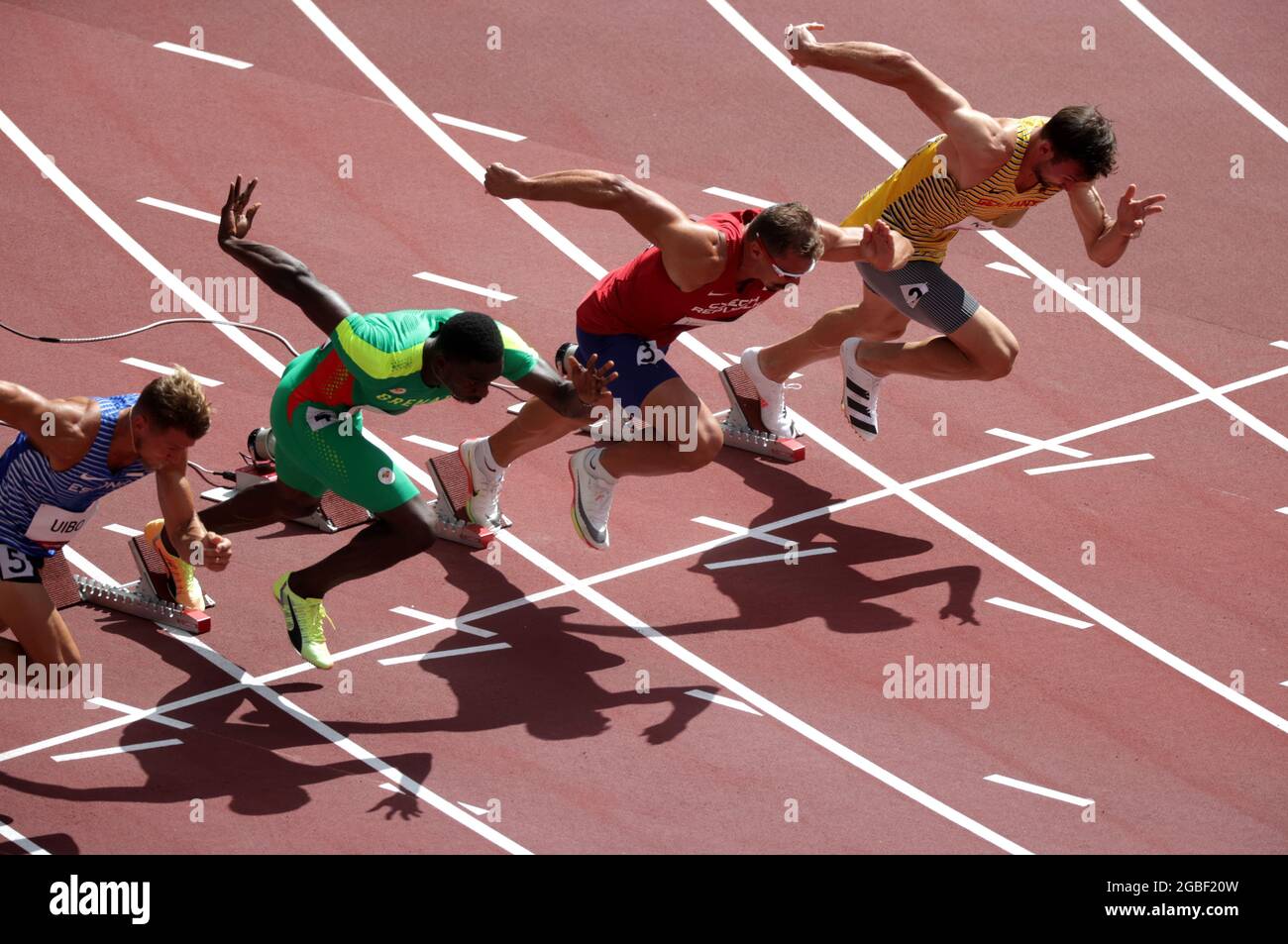 Tokyo 2020 Olympics - Athletics - Men's 100m - Decathlon 100m - Olympic Stadium, Tokyo, Japan - August 4, 2021. Niklas Kaul of Germany, Adam Helcelet of Czech Republic, Lindon Victor of Grenada and Maicel Uibo of Estonia in action at the start of Heat 1 REUTERS/Hannah Mckay Stock Photo