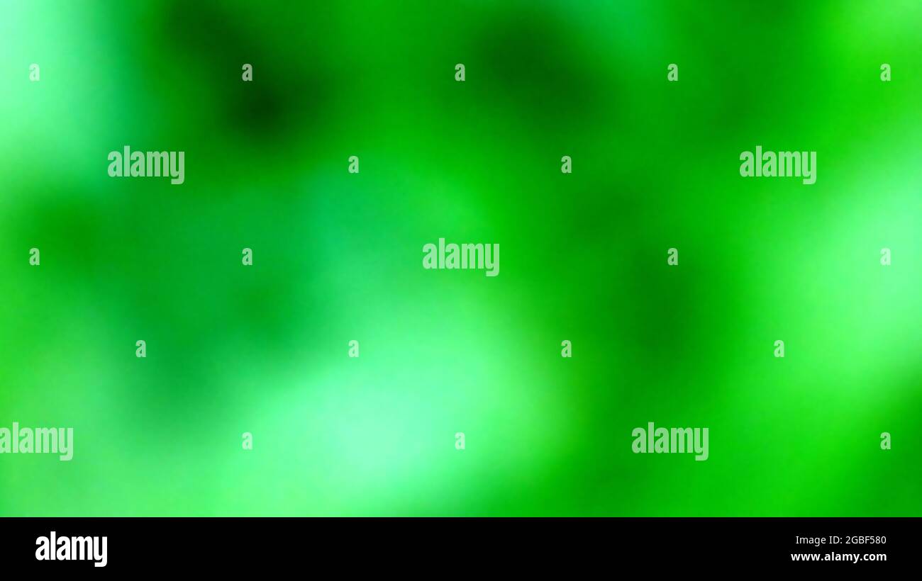 A Green Blurry Blob Abstract Background Stock Photo