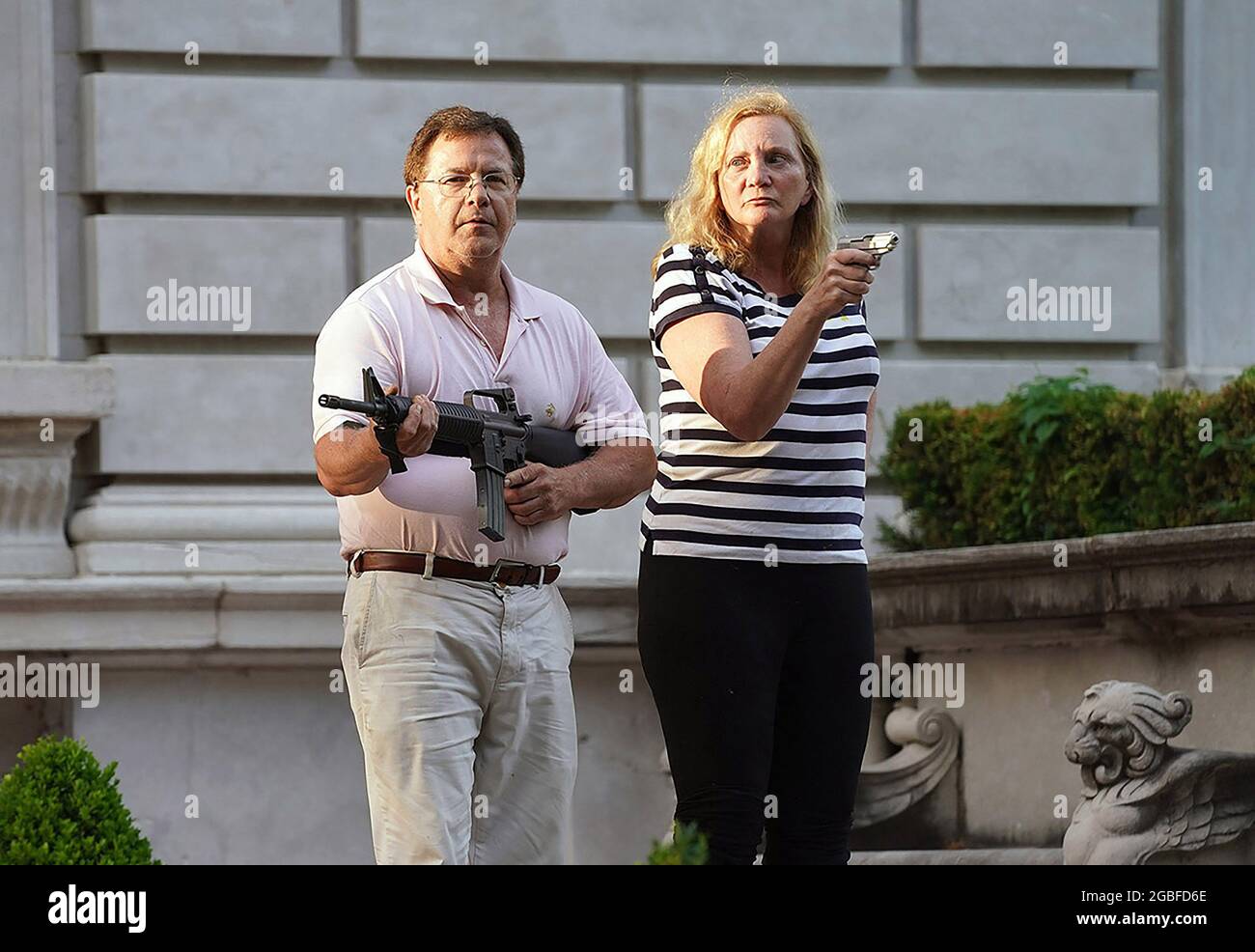 St. Louis, United States. 03rd Aug, 2021. Attorneys Mark and Patricia McCloskey who aimed guns at Black Lives Matter protesters in St. Louis on Sunday, June 28, 2020, have been given pardons by Missouri Governor Mike Parson, it was announced on Tuesday, August 3, 2021. The two have defended their actions by saying they felt their lives were being threatened. On Friday, July 30, 2021, Governor Mike Parson granted 12 pardons and approved two commutations pursuant to Article IV, Section 7 of the Constitution of the State of Missouri. Photo by Bill Greenblatt/UPI Credit: UPI/Alamy Live News Stock Photo