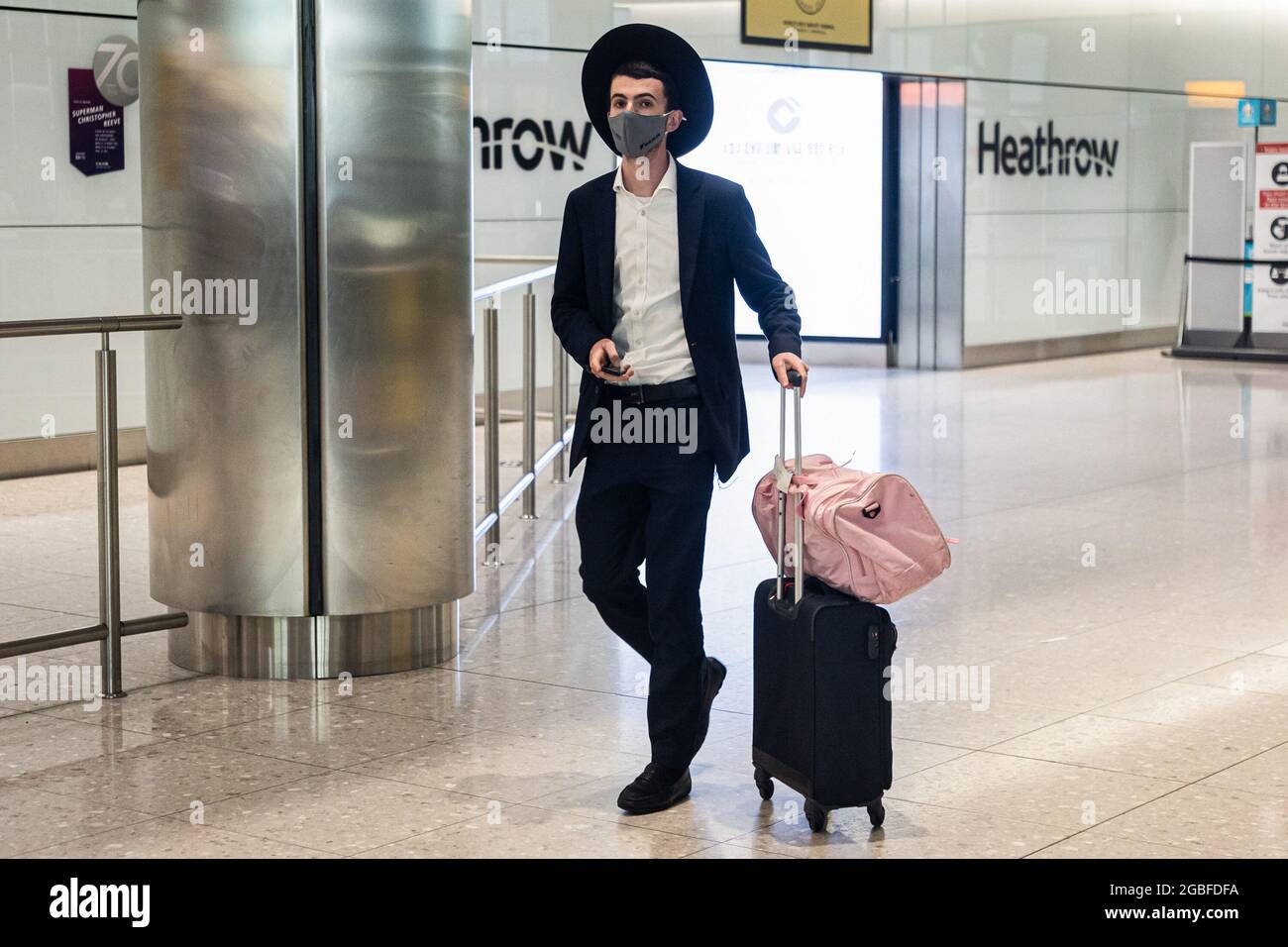 A passenger wearing a face mask as a preventive measure against the