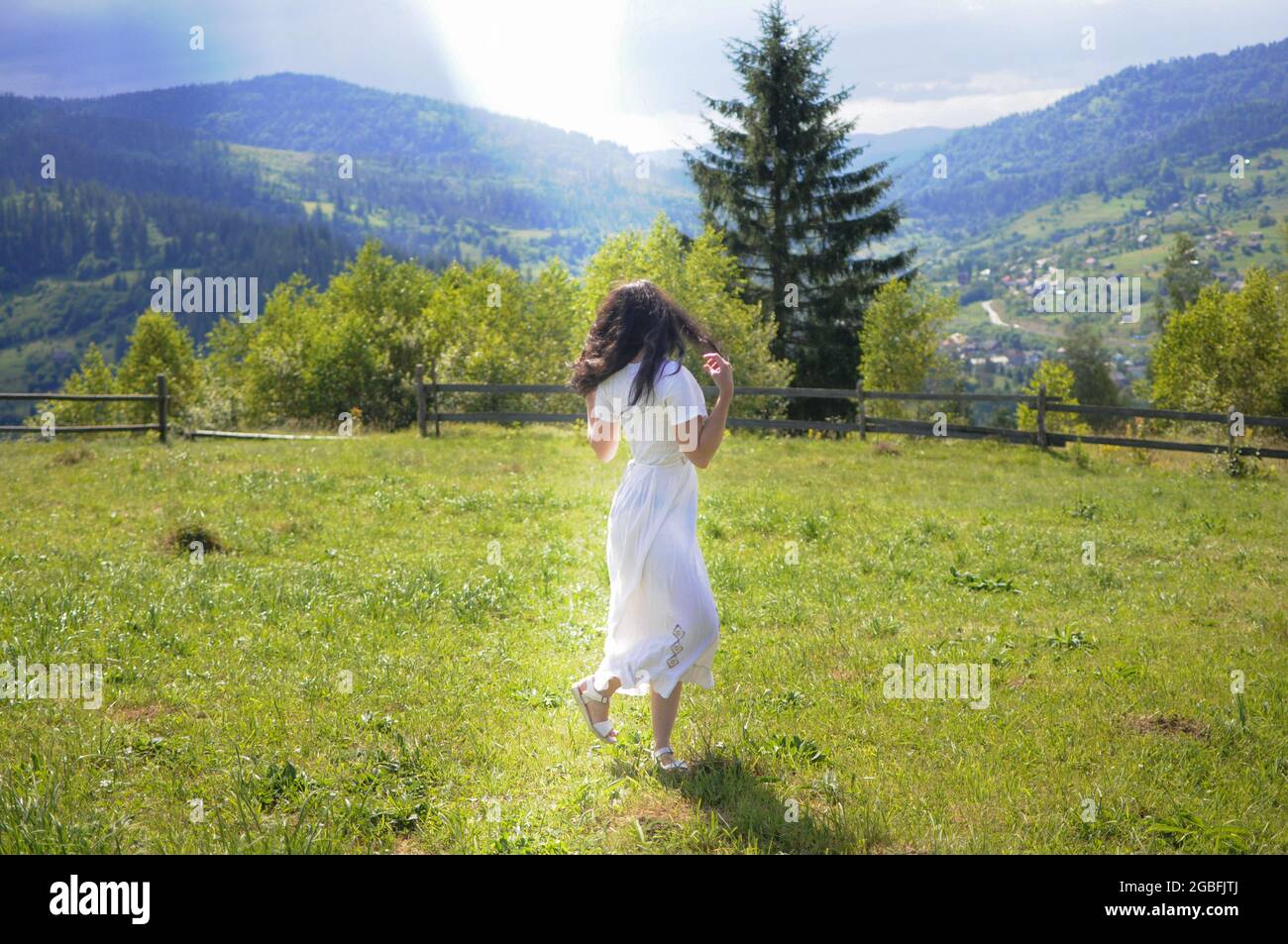 Woman alone walking barefoot grass hi-res stock photography and images ...