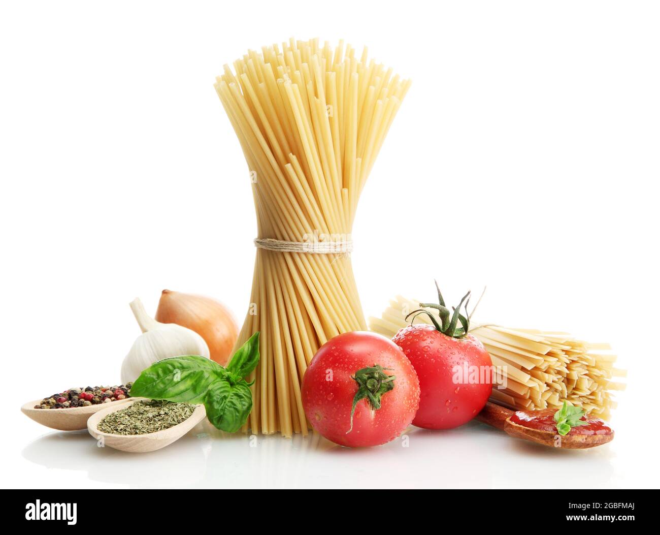 Pasta spaghetti, vegetables and spices, isolated on white Stock Photo ...