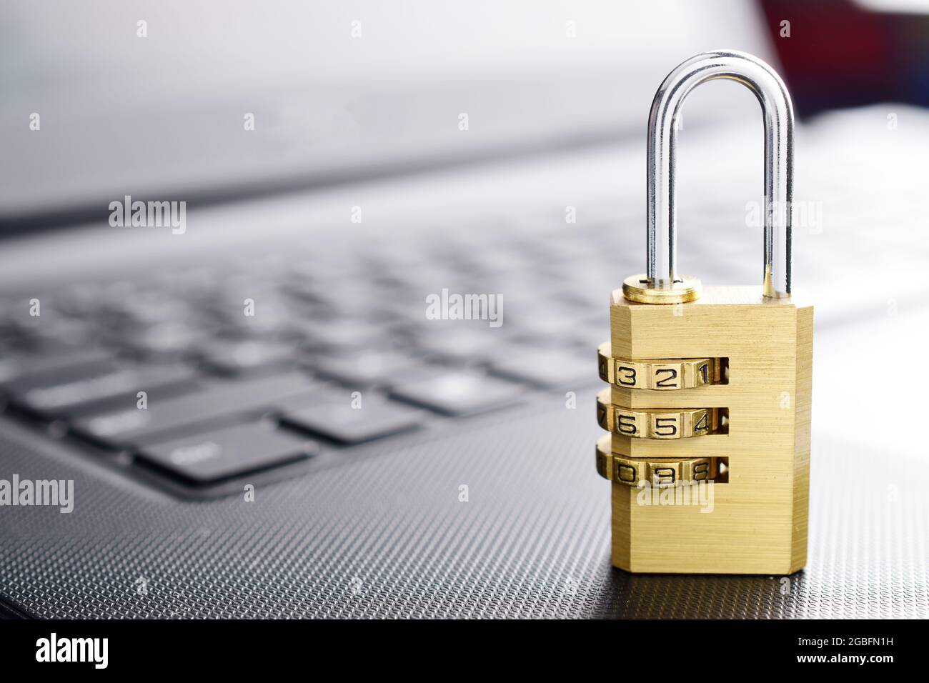 padlock on laptop's keyboard concept. Stock Photo