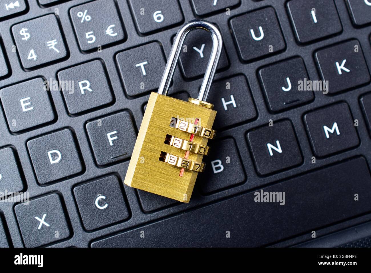 Computer security concept. Padlock on computer keyboard. Selective focus. Stock Photo