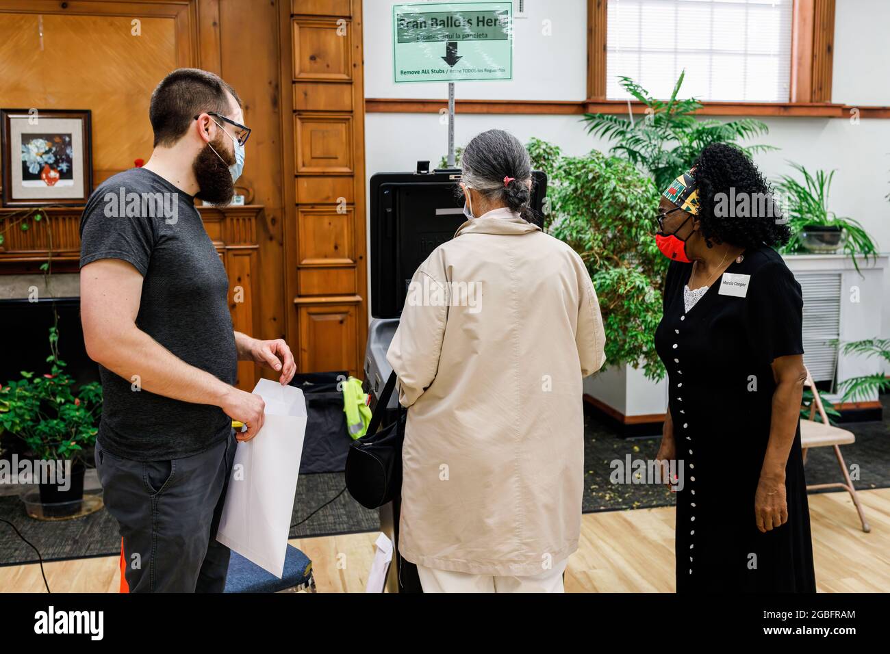 Shaker Heights, United States. 03rd Aug, 2021. Woman places her ballot