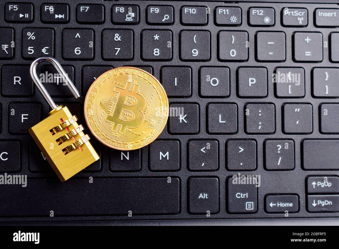 Bitcoin With Unlock Padlock showing Cryptocurrency Hacking Stock Photo -  Alamy