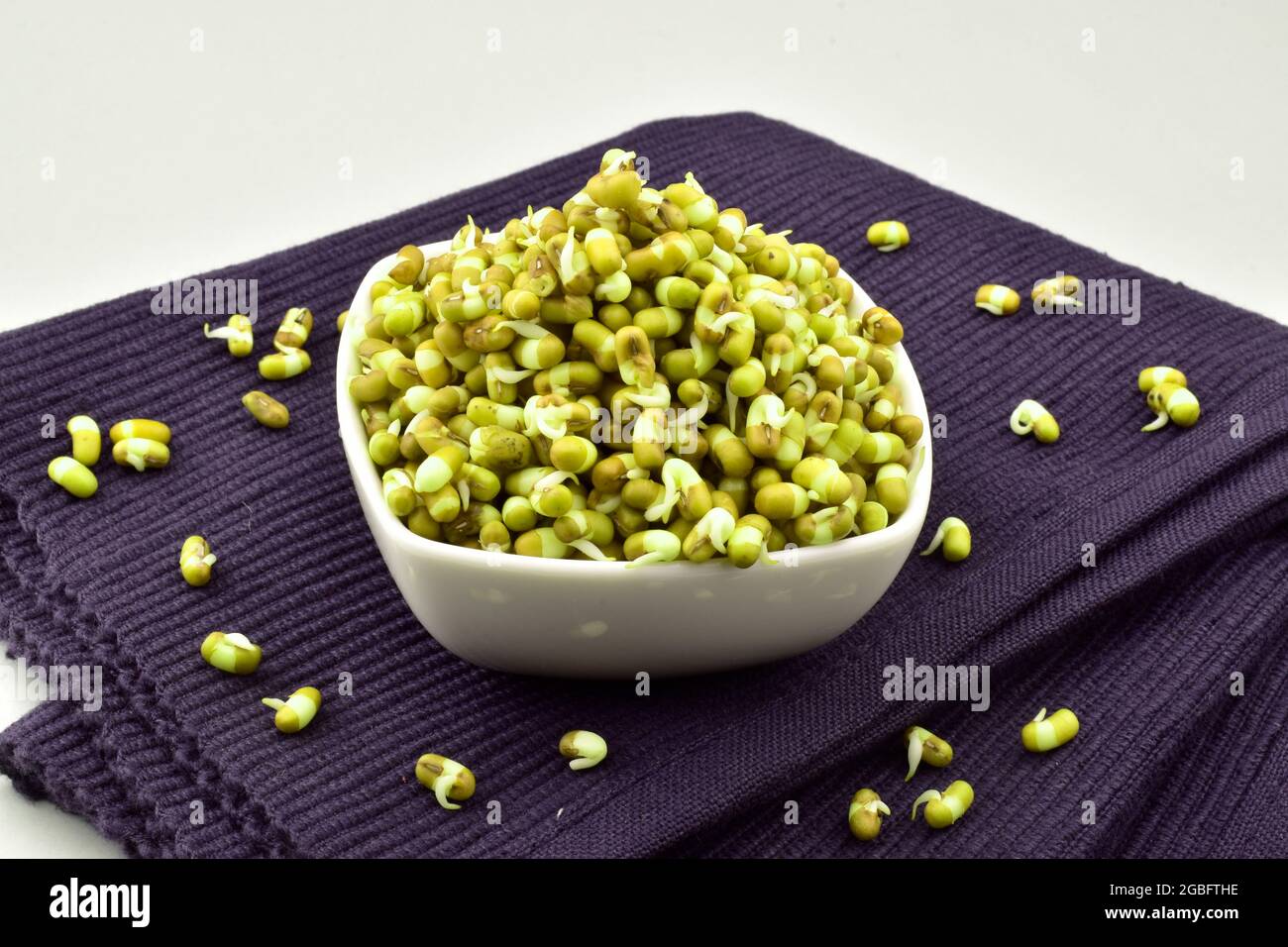 Sprouted Mung Bean In Bowl On White Background Stock Photo